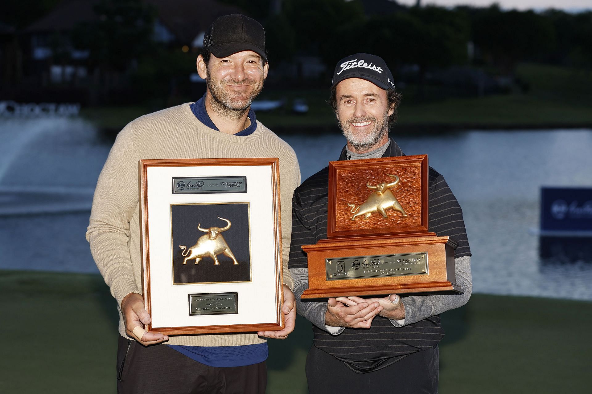 Mark Hensby poses with the trophy after winning the Invited Celebrity Classic